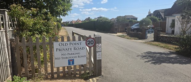 The entrance sign to Old Point: private road, no parking, no through road